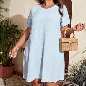 Blue dress with embroidered pattern